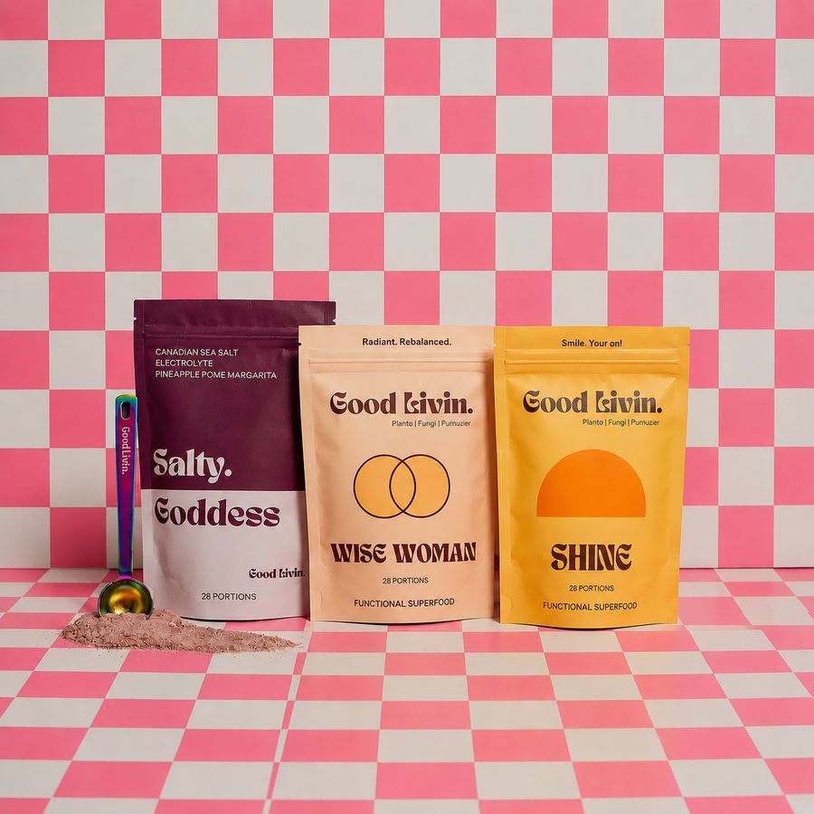 Salty Goddess, Wise Woman and Shine bags on a pink checkerboard with a steel spoon